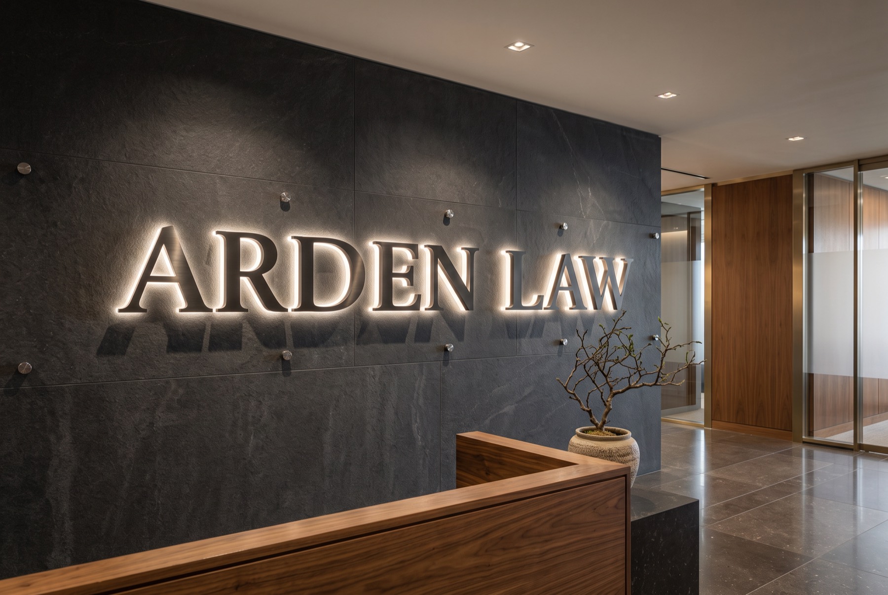 Halo-lit steel letters, law office lobby